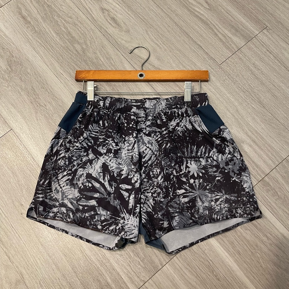 Lululemon surge shorts 4” inseam. Brief liner.